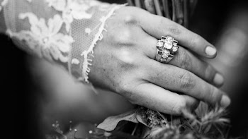 person wearing ring on finger
