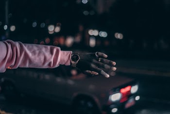 Person Wearing Round Silver-colored Analog Watch With Link Band