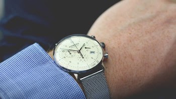 Person Wearing Silver-colored Analog Watch