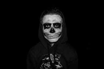 person wearing skull makeup