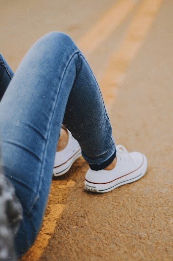 Person Wearing Sneakers