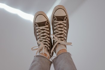 Person Wearing Sneakers