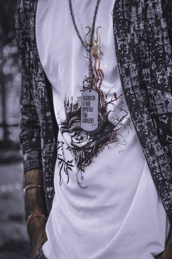 Person Wearing White Shirt And Tag