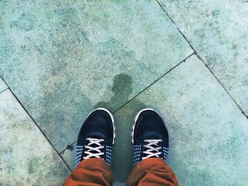 Person Wears Black-and-white Running Shoes