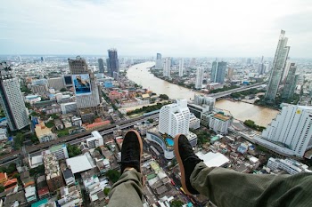 Person Wears Black Sneakers