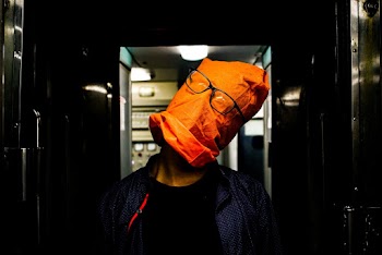 Person With Bag On Head