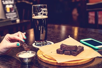 Person With Food and Beer