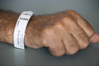 Person With Hospital Tag Labeled As Madeline Ellis 90876
