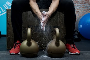 Person With White Powder On Hands
