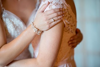 Persons Touching Another Person's Shoulder