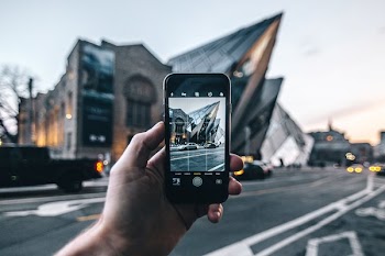 Phone Taking Photo Of Museum