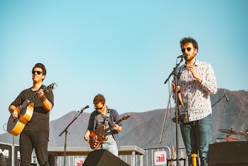 Photo of a Band Performing on Stage