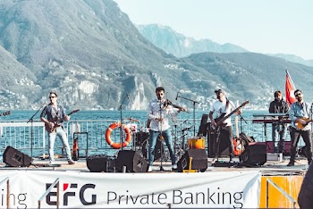 Photo of a Band Playing on Stage