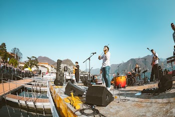 Photo of a Band Playing on Stage