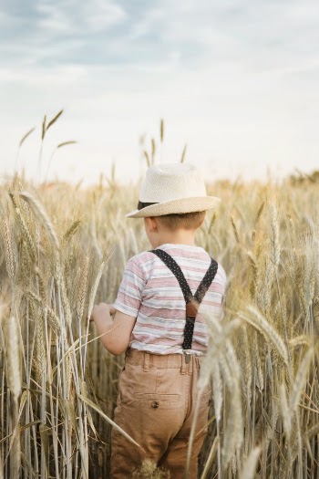 Photo of a Boy Wearing Suspenders