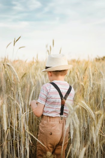 Photo of a Boy Wearing Suspenders