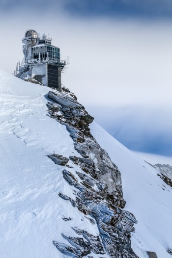 Photo of a Building in a Snowy Hill