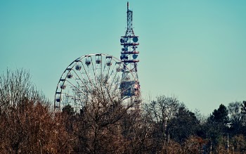 Photo of a Ferris Wheel Beside Tower