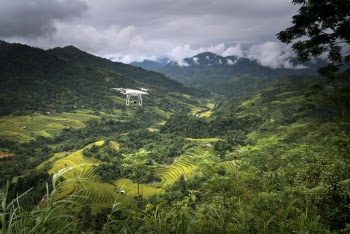Photo of a Flying White Drone