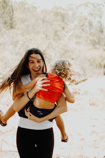 Photo Of A Happy Mother And Child 