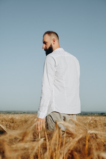 Photo of a Man in Wheat Field