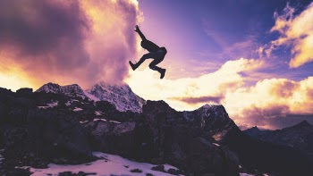 Photo of a Man Jumping High