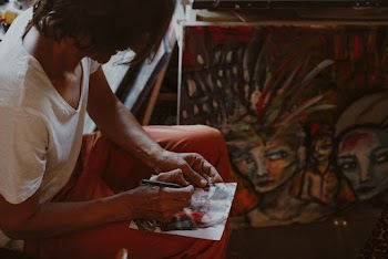 Photo Of A Man Painting