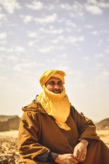 Photo of a Man Sitting