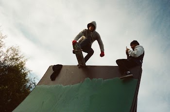 Photo of a Man Skateboarding