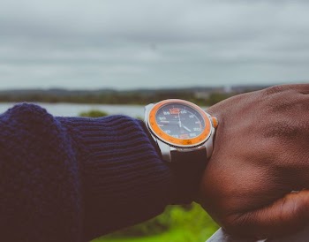 Photo of a Man Wearing Wristwatch