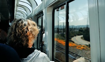 Photo of a Person Inside Vehicle Looking Outside