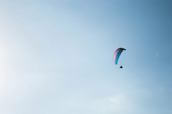 Photo of a Person Paragliding