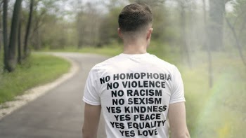 Photo of a Person Wearing Printed Crew-neck T-shirt