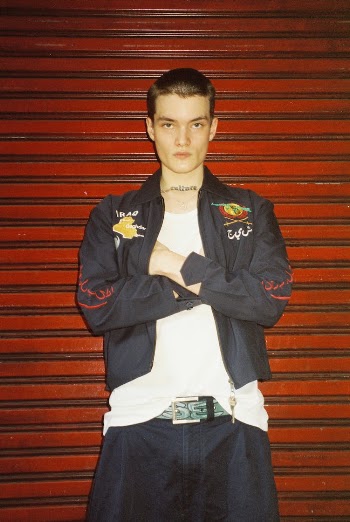 Photo of a Standing Man with Crossing Arms