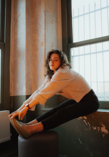Photo of a Stretching Woman