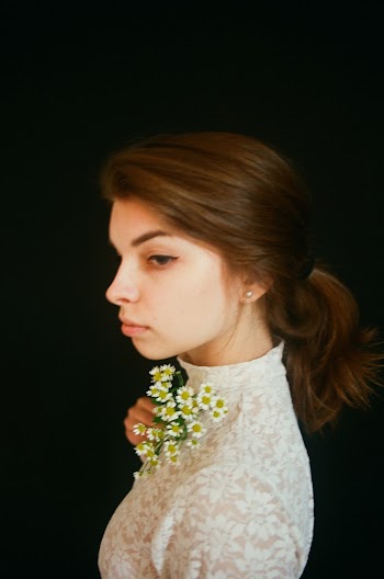 Photo of a Woman Facing Sideways