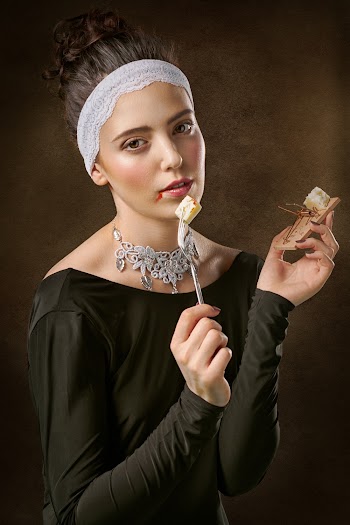 Photo of a Woman Holding Fork And Mousetrap
