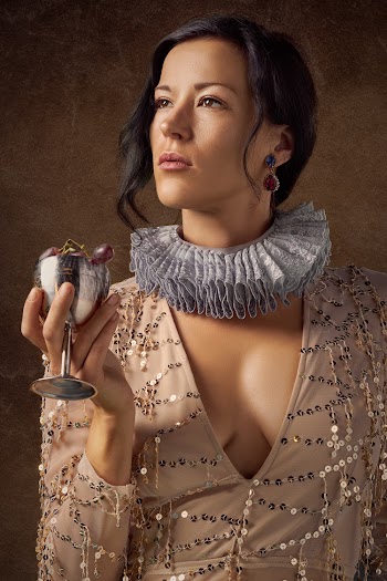 Photo of a Woman Holding Wine Cup