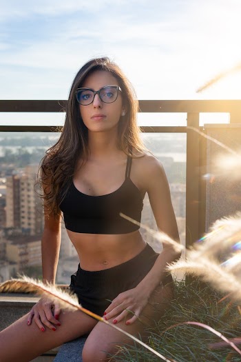 Photo of a Woman in Black Brassiere