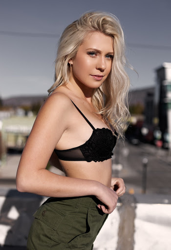 Photo of a Woman Wearing Black Bra
