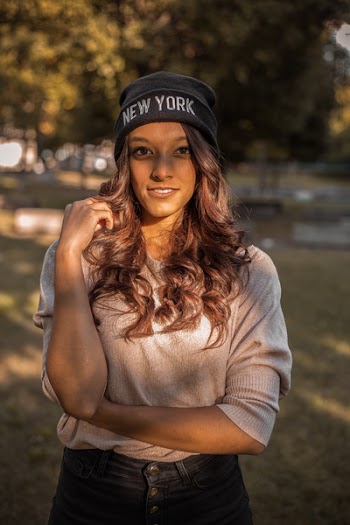 Photo of a Woman Wearing Bonnet