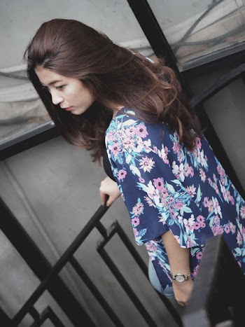Photo of a Woman Wearing Floral Kimono