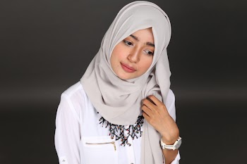 Photo of a Woman Wearing Hijab