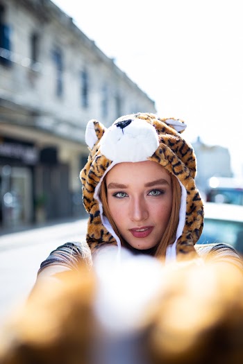 Photo of a Woman Wearing Tiger Hoodie