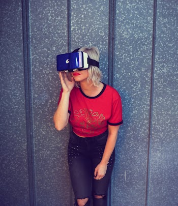 Photo of a Woman Wearing Virtual Reality Headset