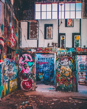 Photo of Abandoned Building With Graffiti