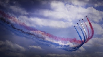 Photo of Airplanes Performing Aerobatics
