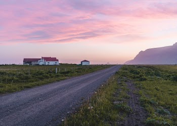 Photo of an empty gravel road