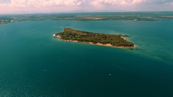 Photo of an Island in the Middle of the Ocean