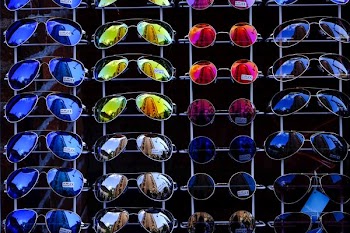 photo of assorted-color-and-design sunglasses lot
